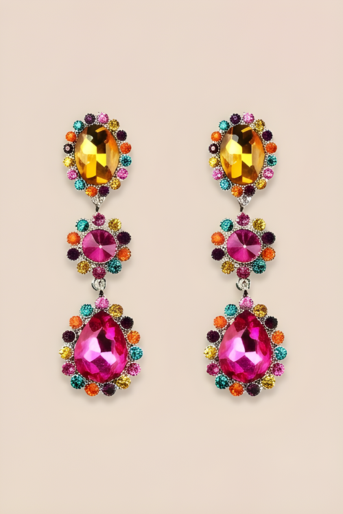Colorful gemstone earrings on a beige background