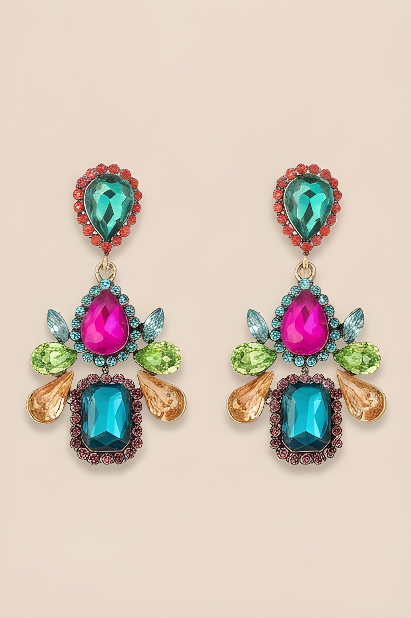 Colorful gemstone earrings on a beige background