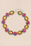 Colorful beaded necklace on a beige background