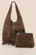 Brown suede handbag with fringe and matching pouch on a beige background